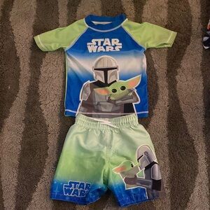 Star Wars toddler swimsuit. Top is a 3T and Bottom is a 2T.